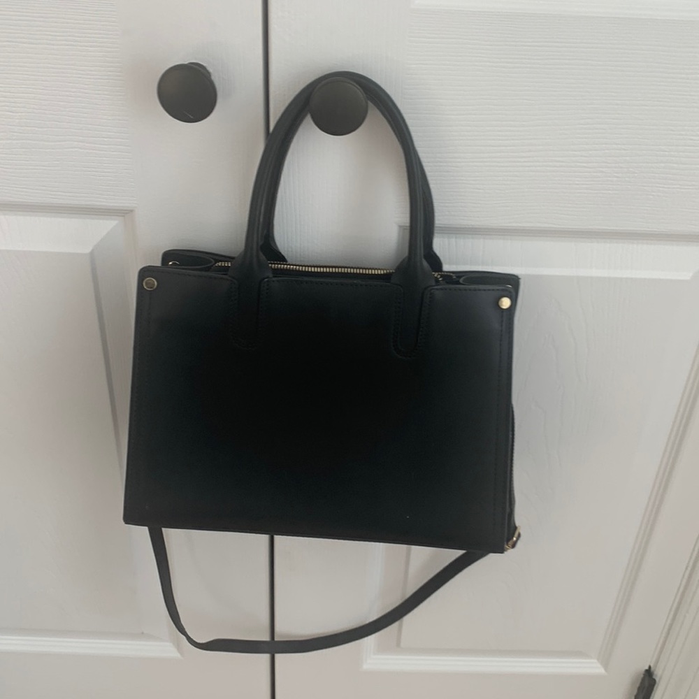 Black leather purse with strap